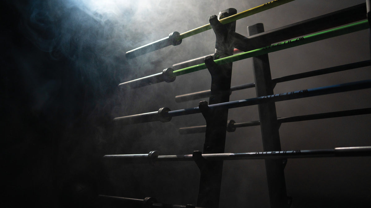 Atletica barbells on a barbell rack in the gym