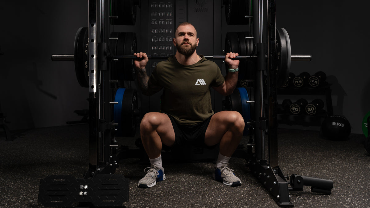 Back squat on the Smith Machine of the All-in-One Trainer