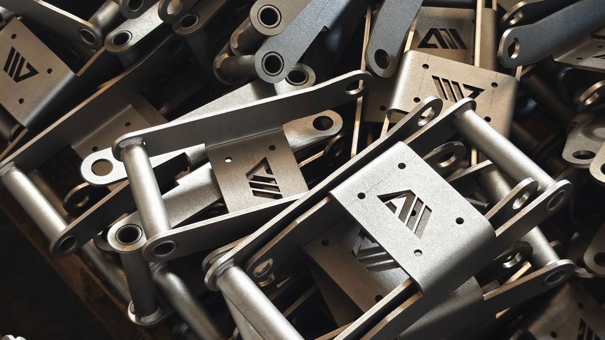 Unassembled Jammer Arms components in heavy-duty steel from Atletica