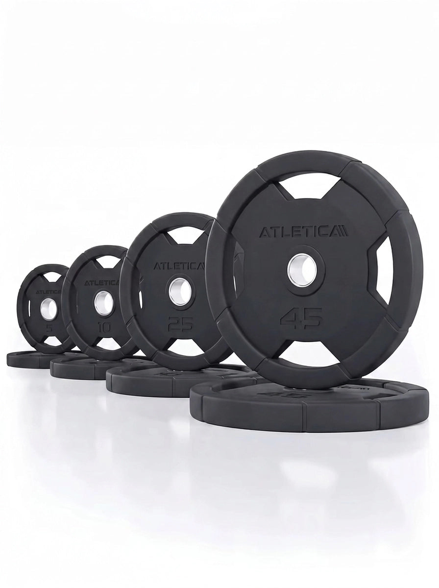 Atletica 4H Grip Plates set 170 lb, black rubber-coated plates lined up by size
