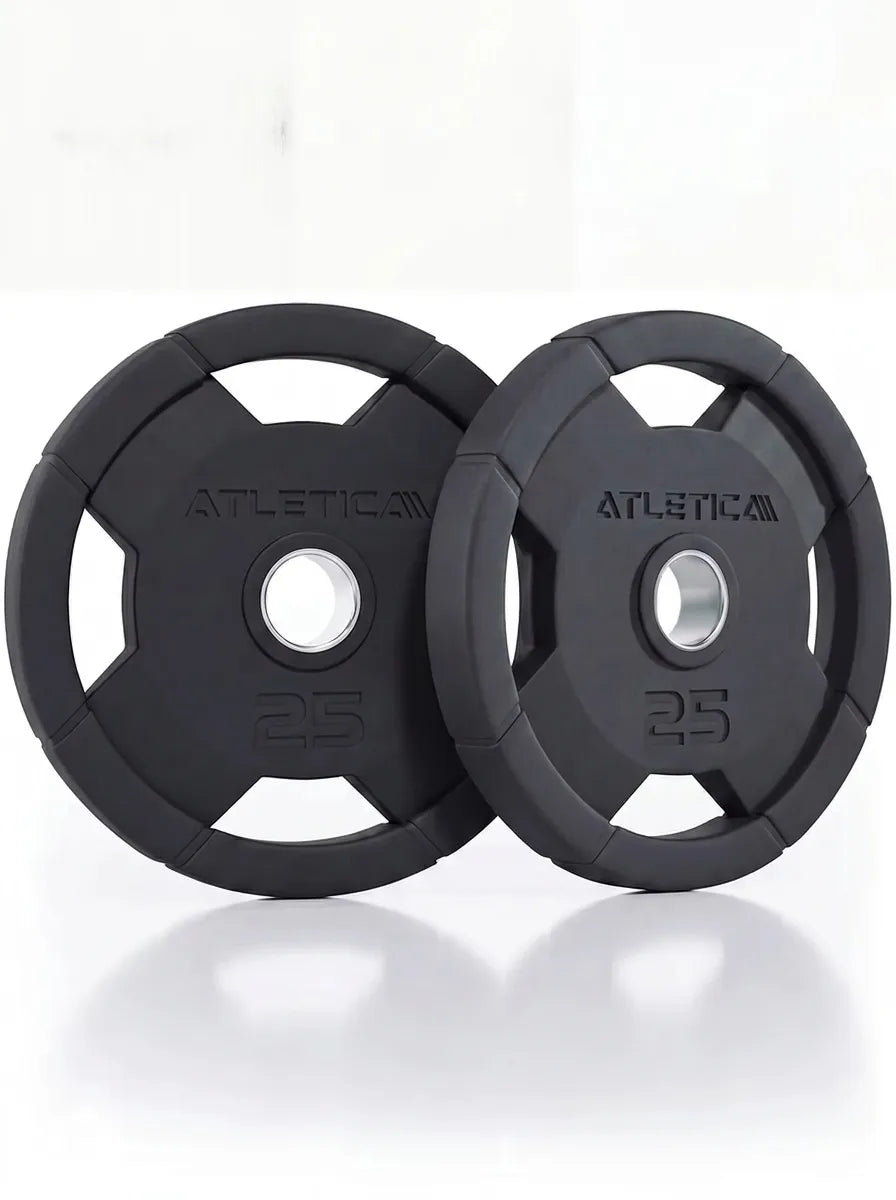 Atletica 4H gripper plates 2x25 lb standing side by side, angled view