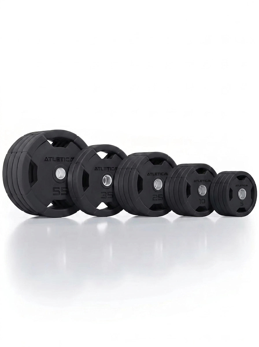 Atletica 4H gripper plates set 450 lb, plates standing in a row, front angled view
