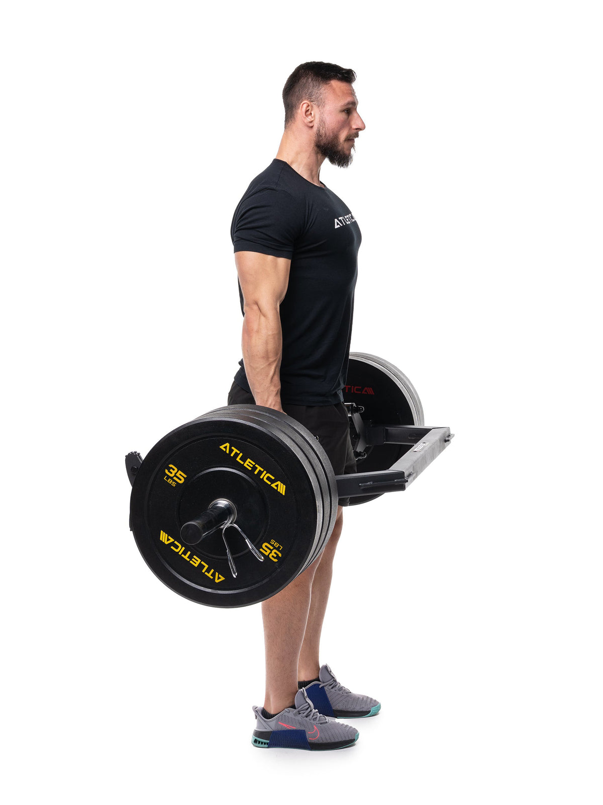 Specialty barbell - deadlift with the Open Hex Bar, loaded with black Bumper Plates