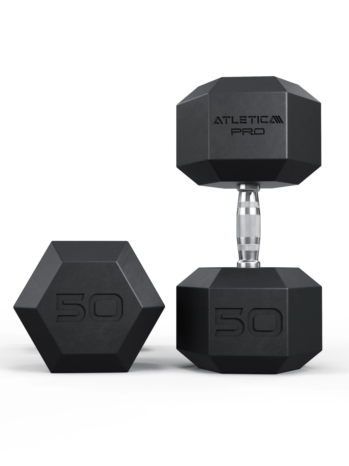 Atletica Hexagon PRO dumbbells 110 lb pair, black rubber hex heads, one upright beside one lying on its side