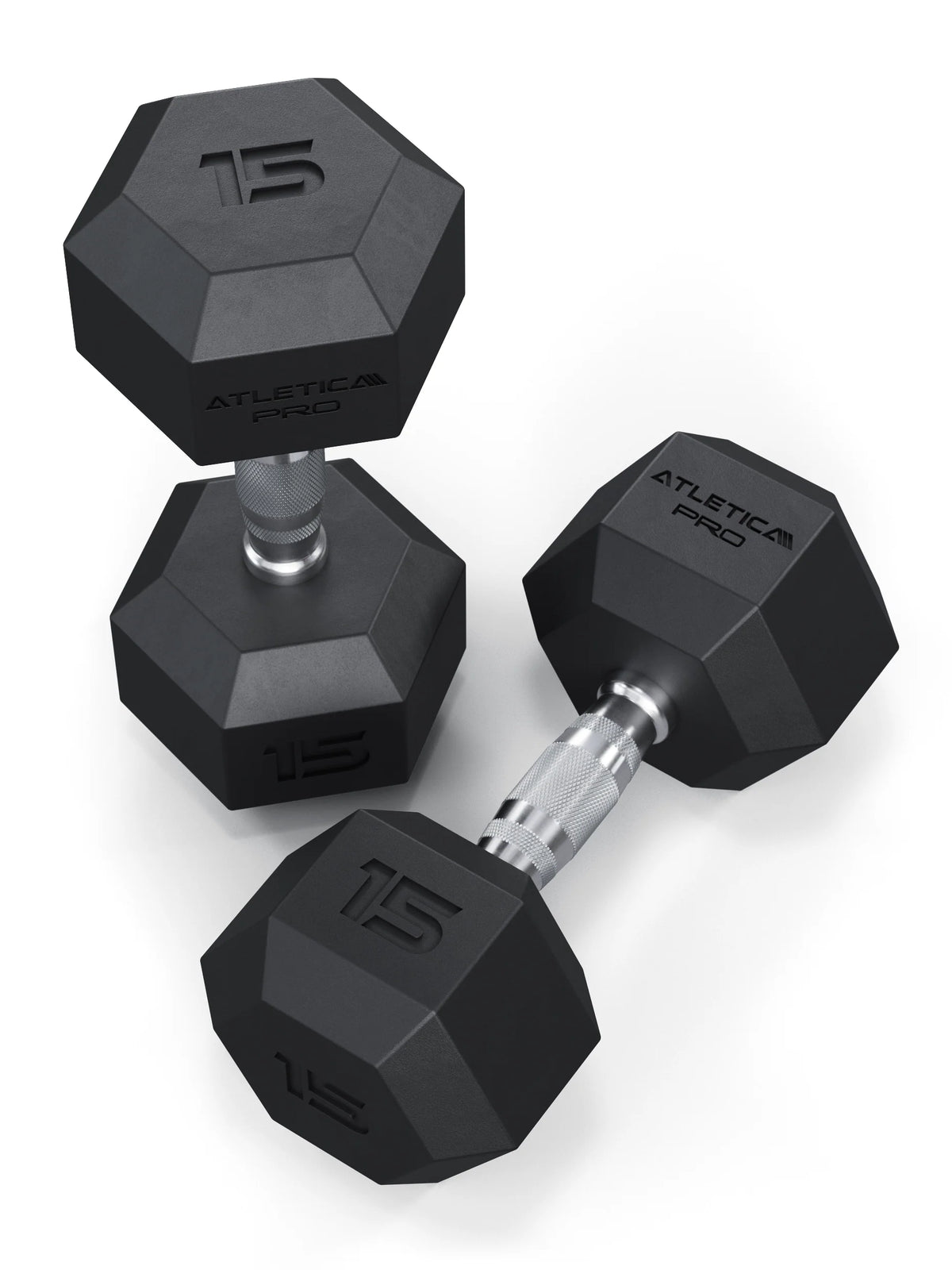 Atletica Hexagon PRO dumbbells 33 lb pair, one upright and one lying tilted, angled top view