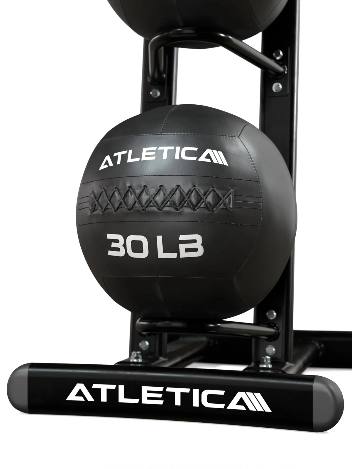 Atletica WallBall Stand – detail view 12-kg ball in the holder