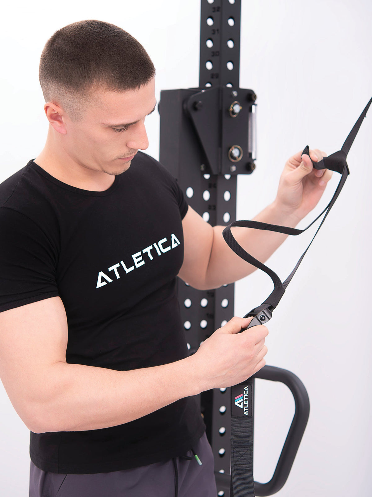 Suspension Trainer carabiner with hand in detail