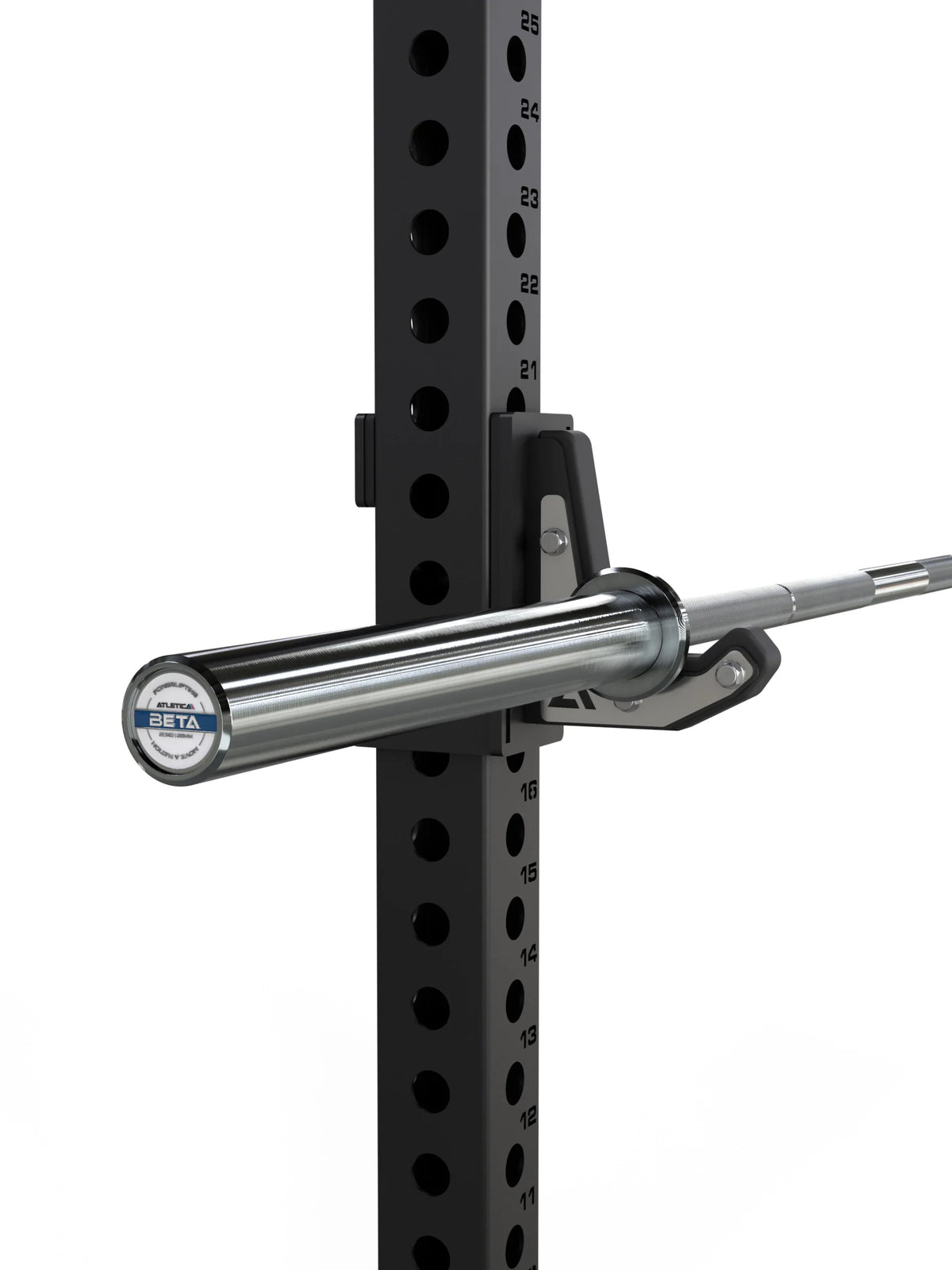 Atletica Beta powerlifting bar, chrome, resting in a J-hook on a power rack