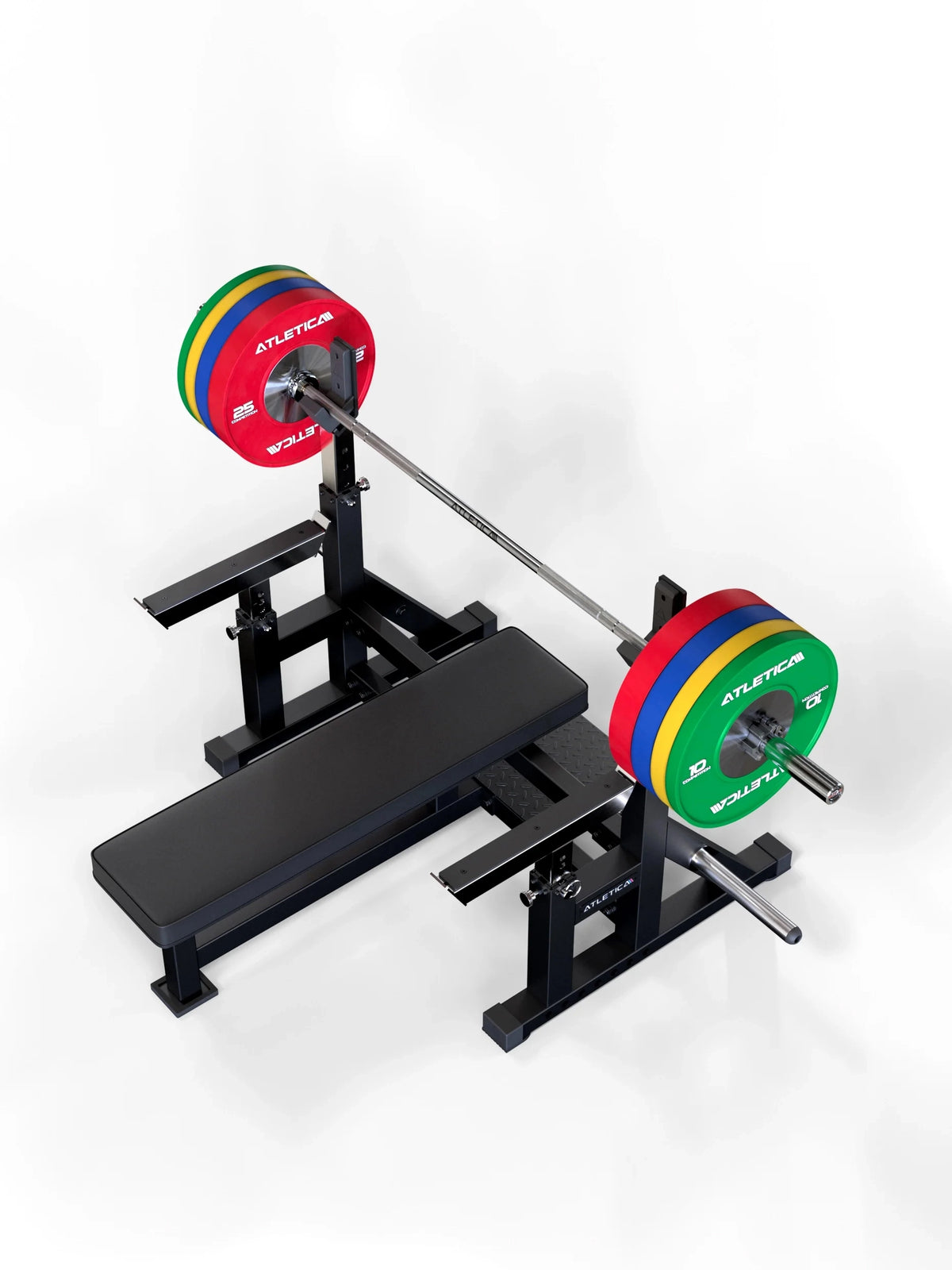 Yota Barbell in a squat rack setup with weight bench and Bumper Plates