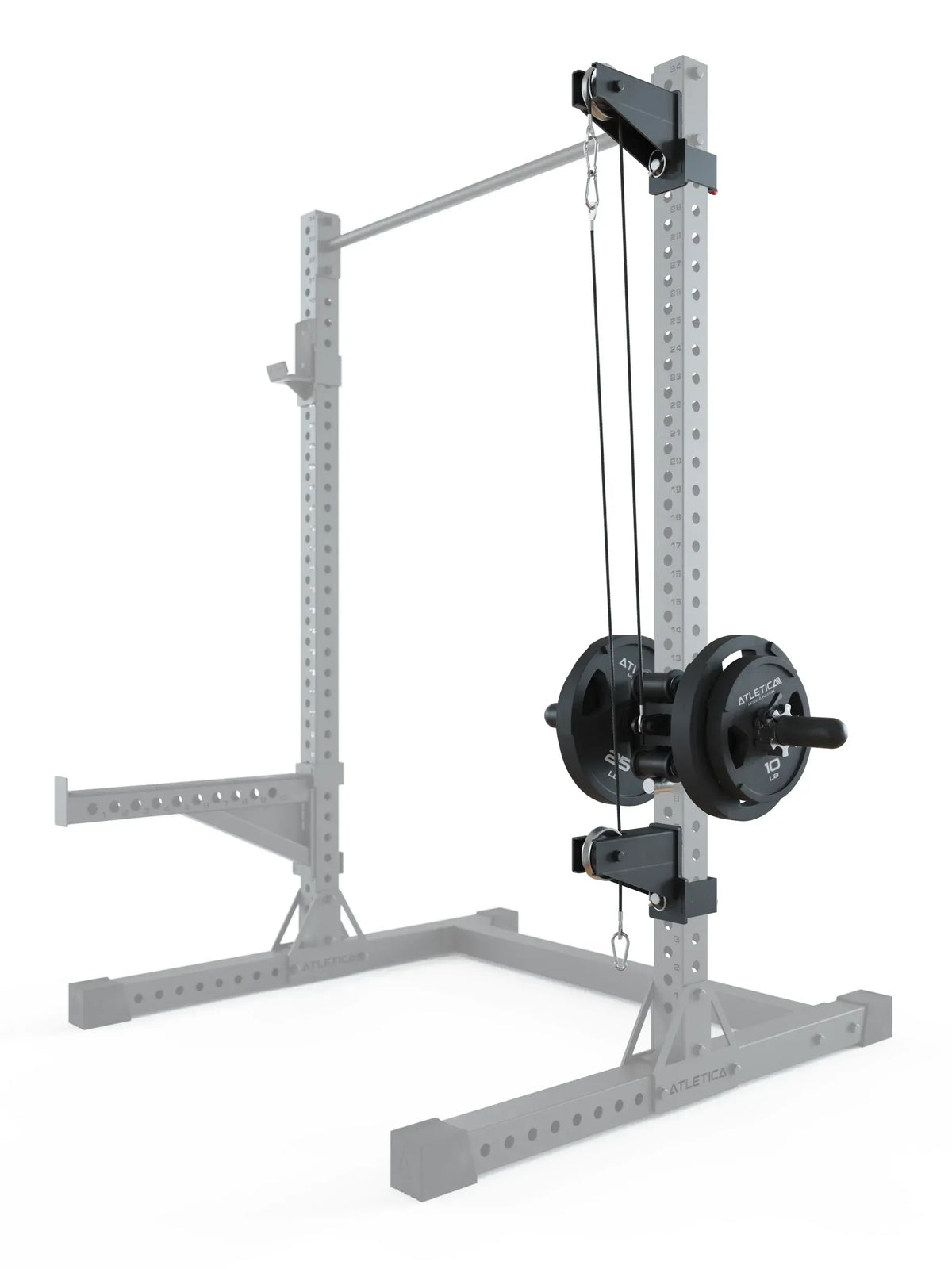 Atletica R7 Plate Loaded Cable System with weight plates on the Power Rack for heavy strength training and muscle building, side view