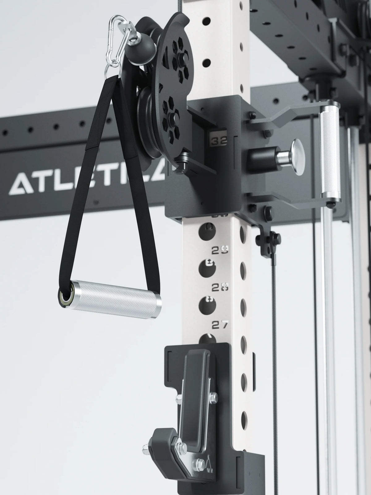 R8 Bradley Power Rack - Close-up of a cable pulley system with handle, perforated sheet and logo on metal frame