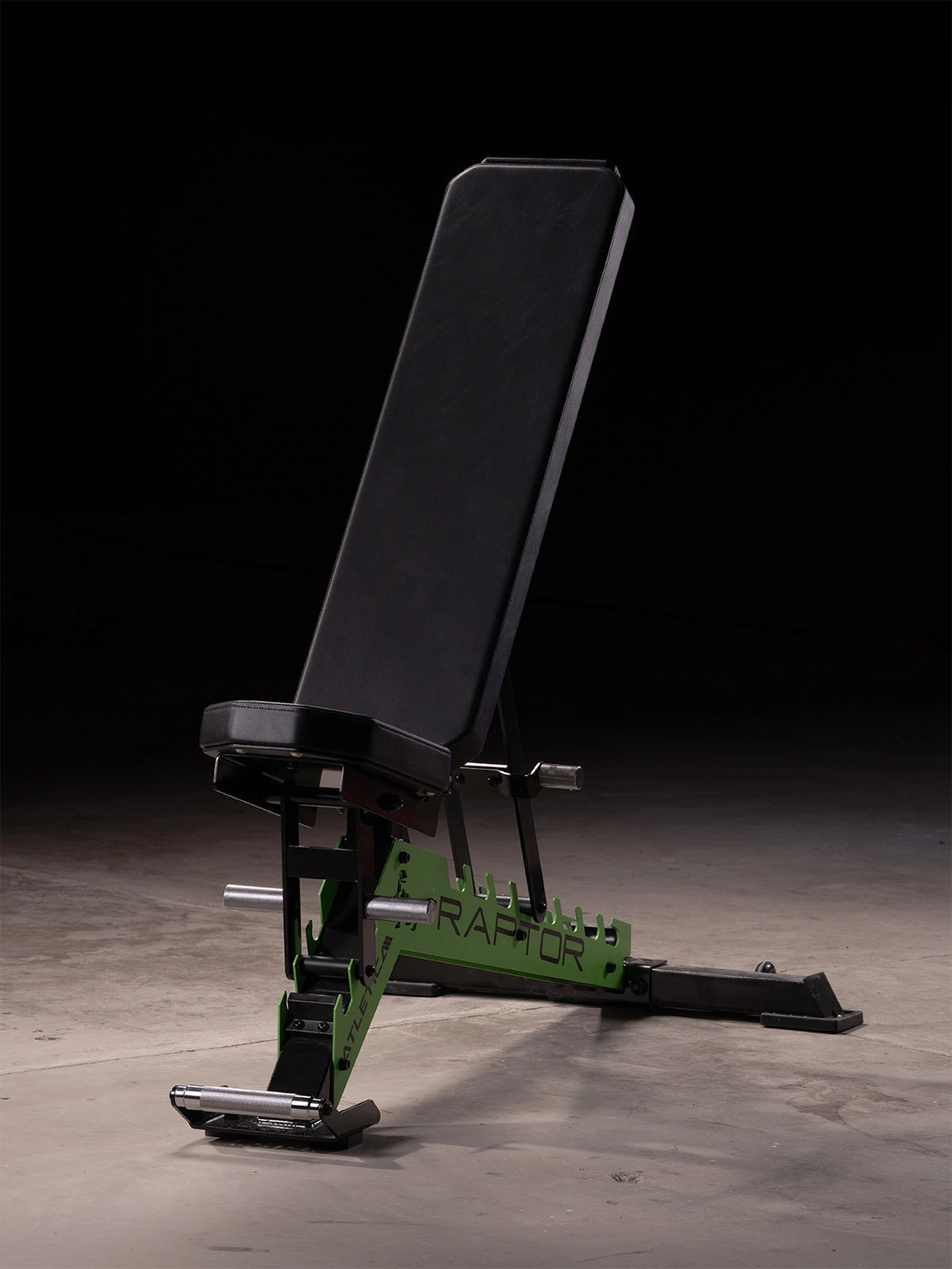 Atletica Raptor bench with black leather pad and electric green toothed plate, incline position