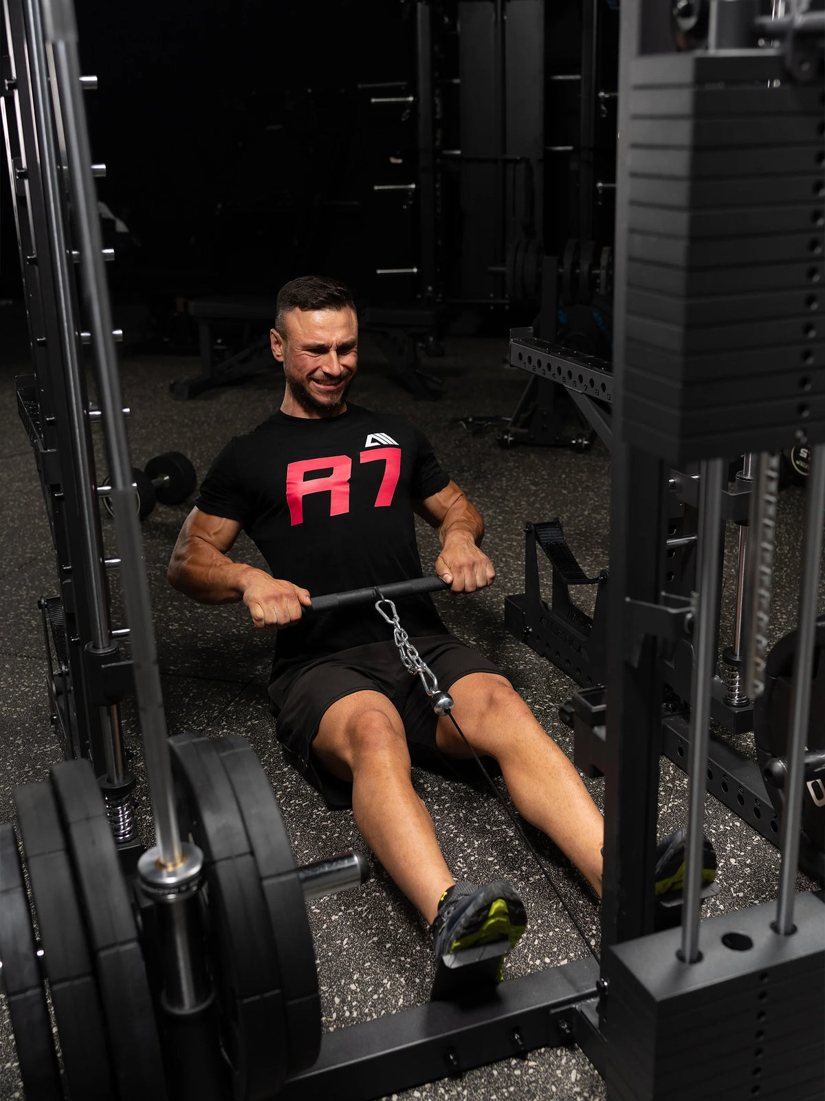 R7 Nemesis Squat Rack - seated rowing at the Lat Pulldown station