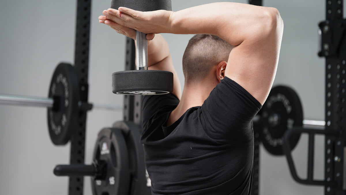 Overhead triceps extension with the Atletica round dumbbell