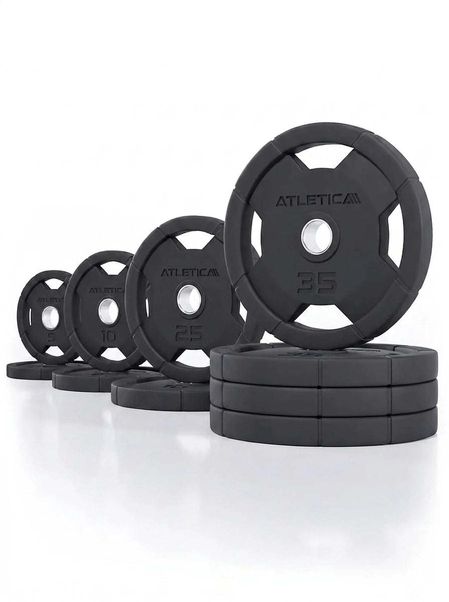 Atletica 4H Grip Plates set 240 lb, black plates lined up with largest plates stacked