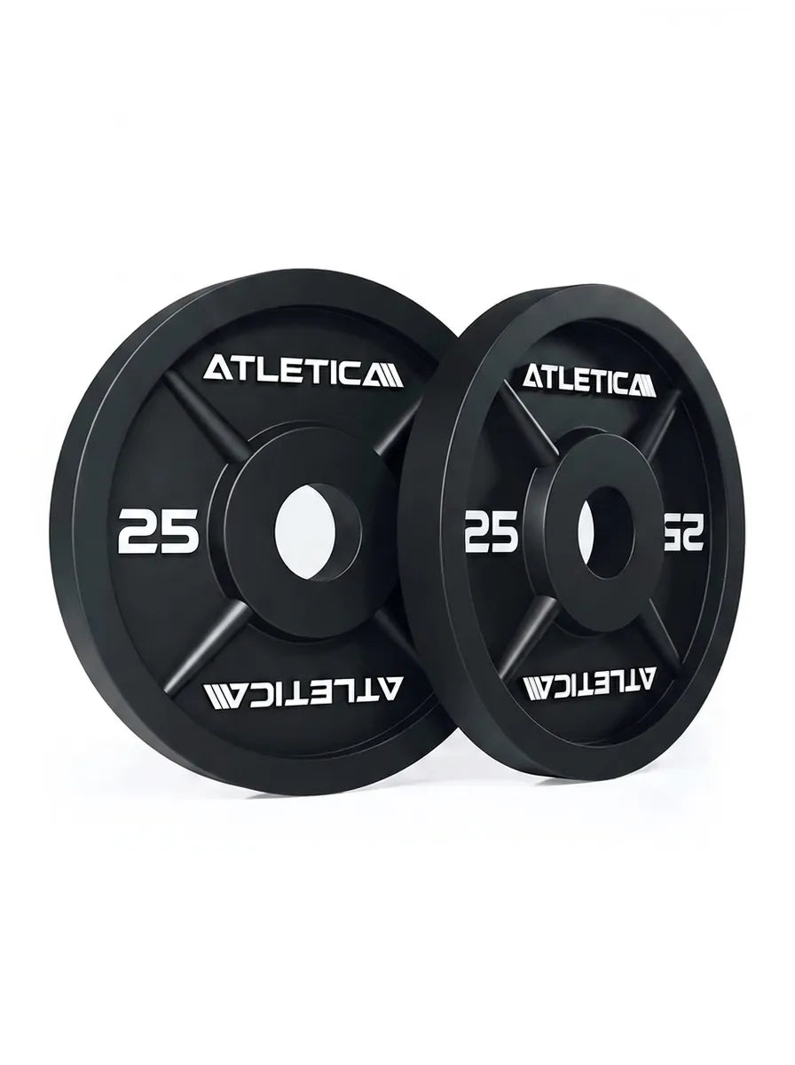 Iron Plates - Two black cast iron weight plates, 25 lb each, with central hole