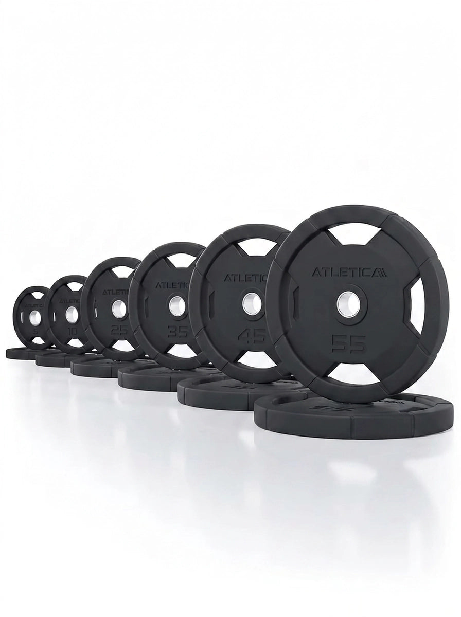 Atletica 4H Grip Plates set 350 lb, black plates lined up in pairs by size
