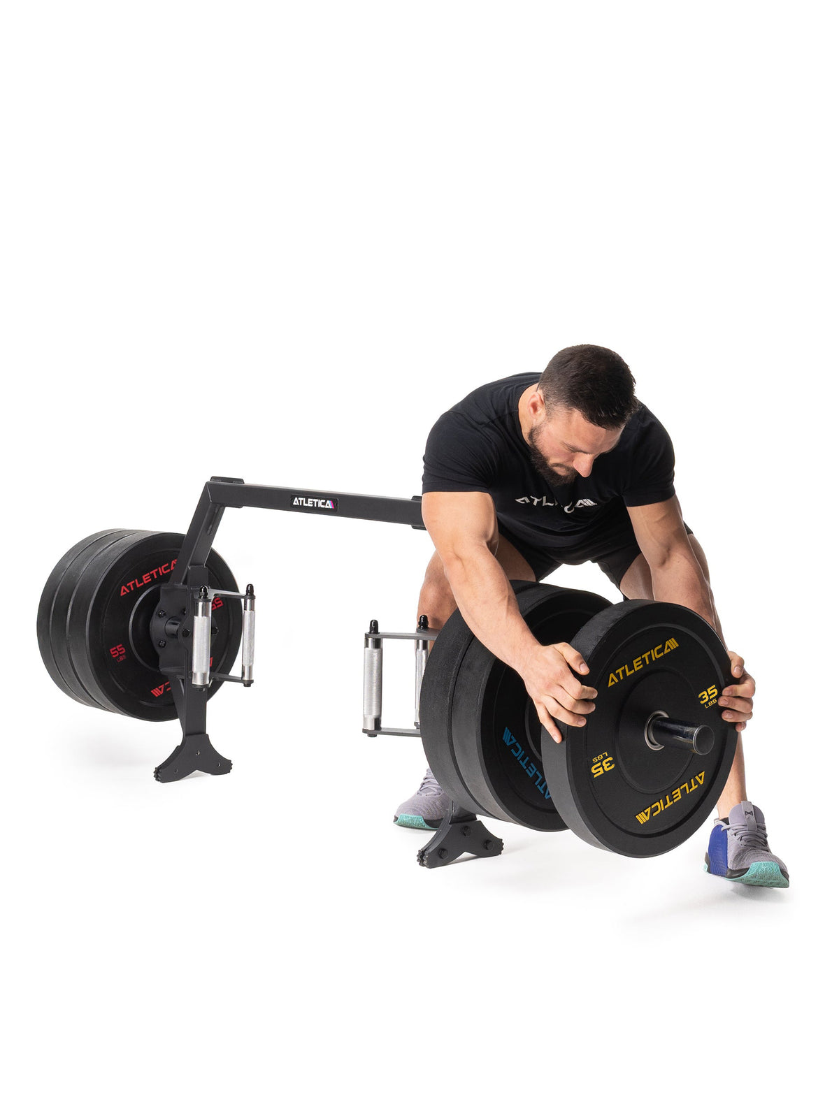 Open Hex Bar loaded with several weight plates, for deadlifts and leg presses