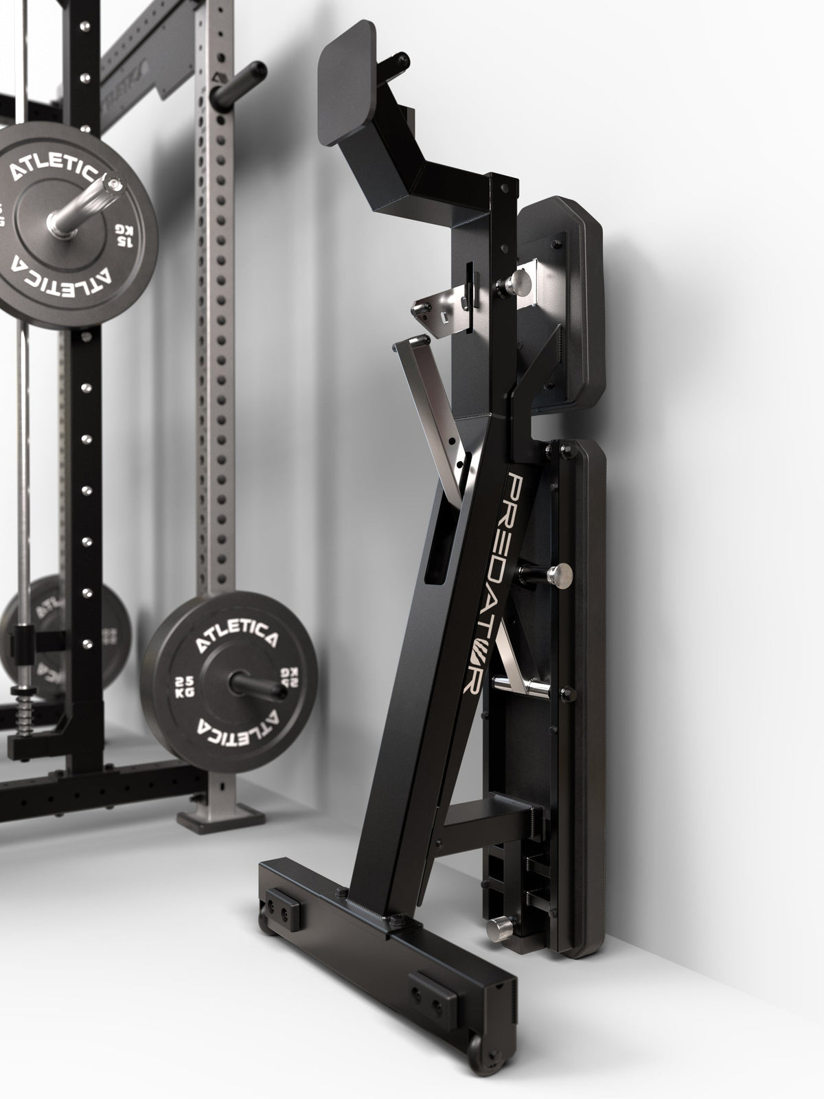 Atletica Predator bench stored upright next to a rack with weight plates