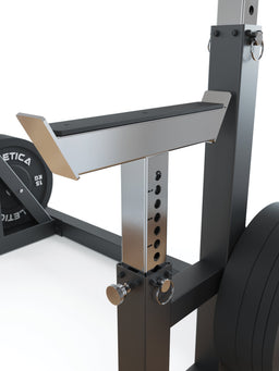 Atletica Dome squat rack, close-up of the height-adjustable spotter arm