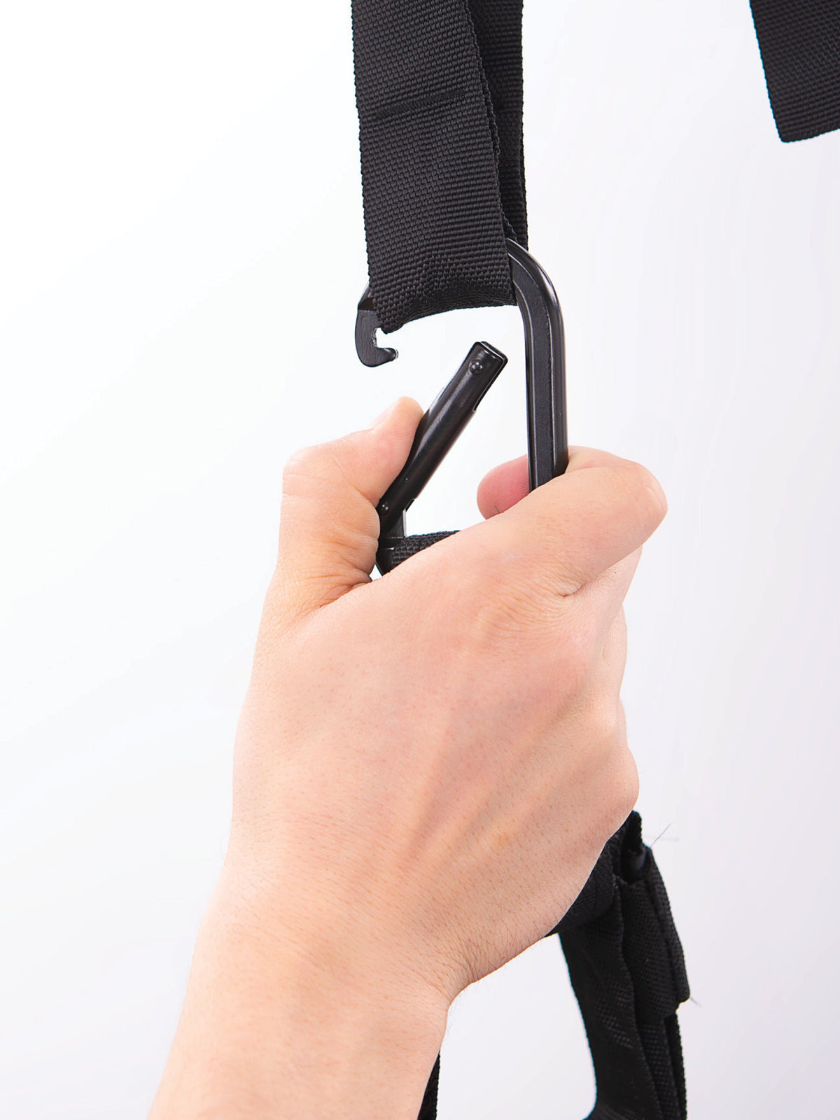Suspension Trainer carabiner with hand in detail