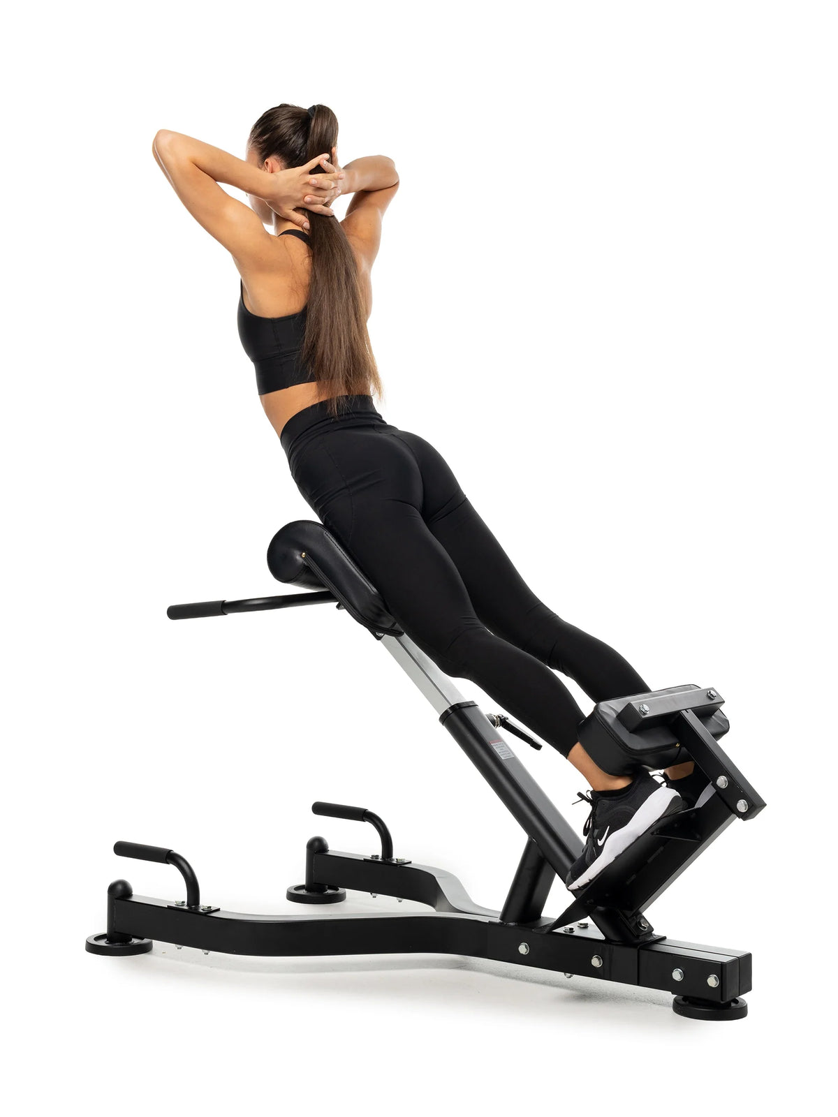 Hyperextension Adjustable – Use of the Back Extension Machine with Female Athlete During Exercise for Lower Back and Core