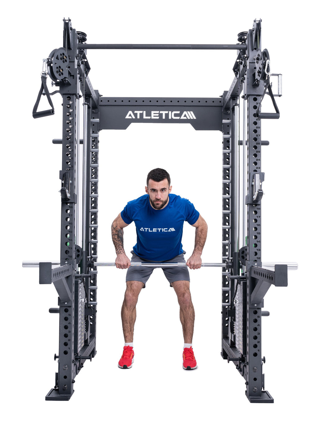 Man doing barbell deadlifts in the Atletica R8 Bradley Long