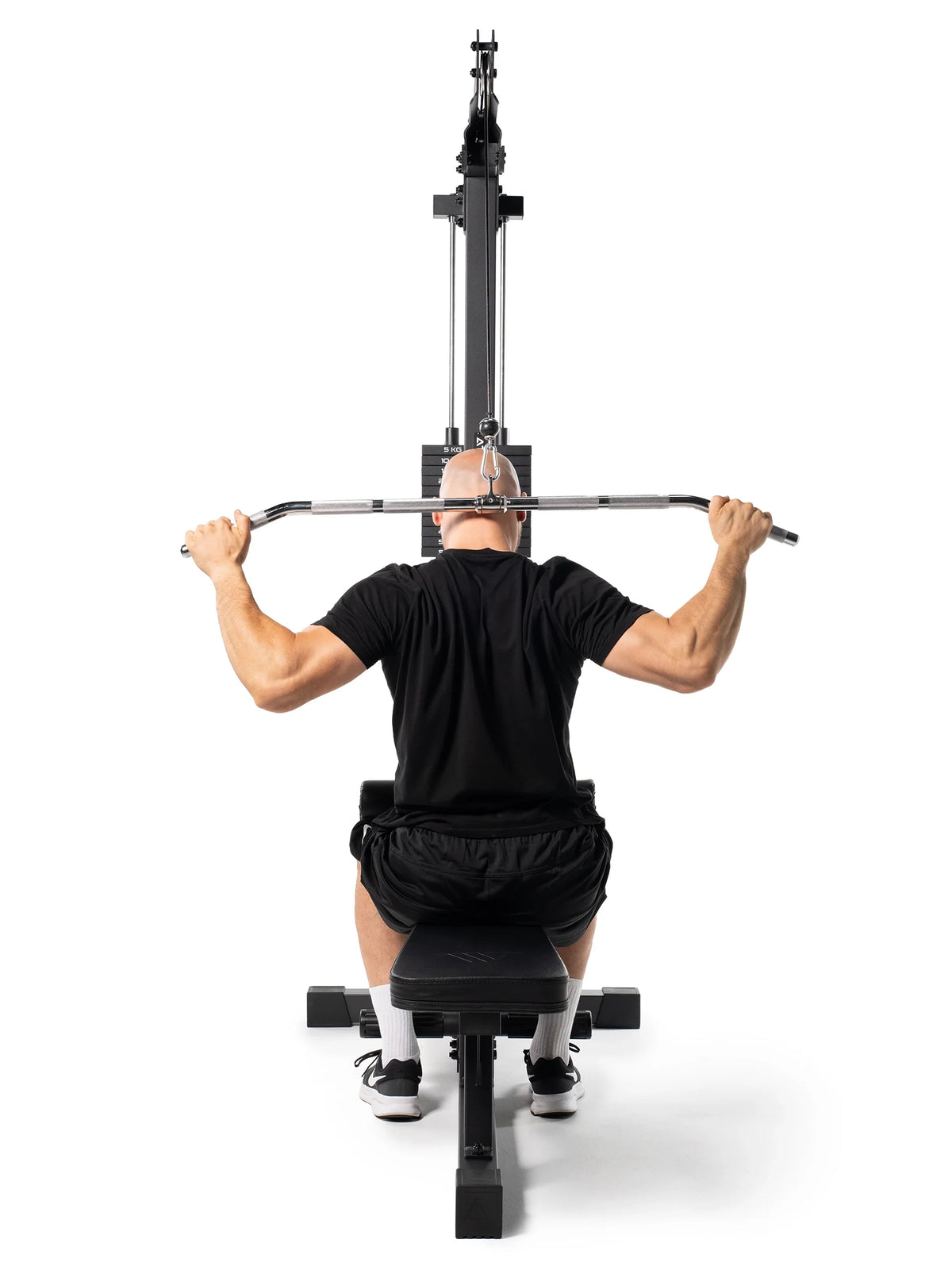Athlete on the Lat Pulldown with wide grip bar for targeted lat and back training