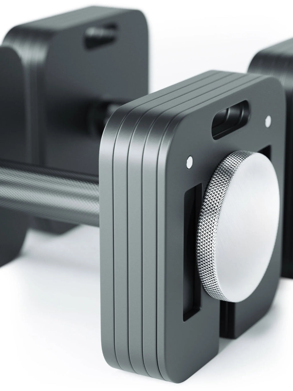 QUAD Adjustable Dumbbell detail view grip structure and adjustment dial close-up