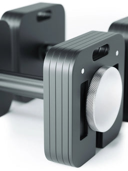 QUAD Adjustable Dumbbell detail view grip structure and adjustment dial close-up