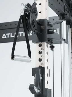 R8 Bradley Power Rack - Close-up of a cable pulley system with handle, perforated sheet and logo on metal frame