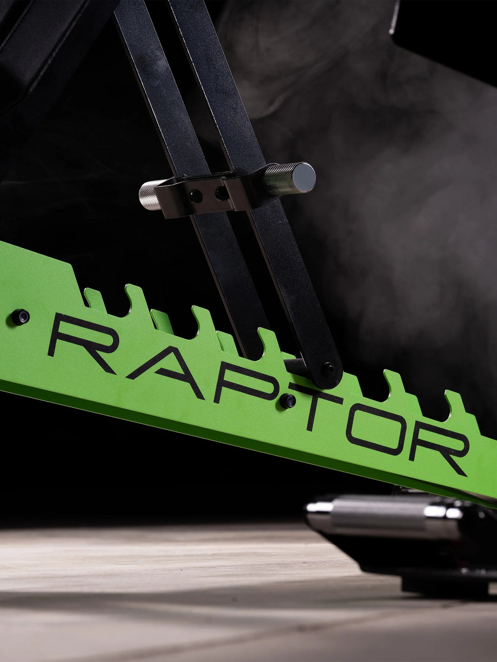 Atletica Raptor bench, detail of the Electric Green toothed adjustment plate with Raptor lettering