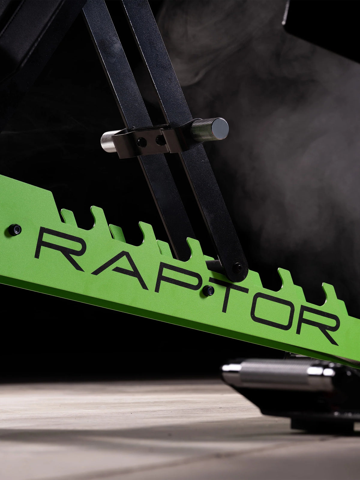 Atletica Raptor bench, detail of the Electric Green toothed adjustment plate with Raptor lettering