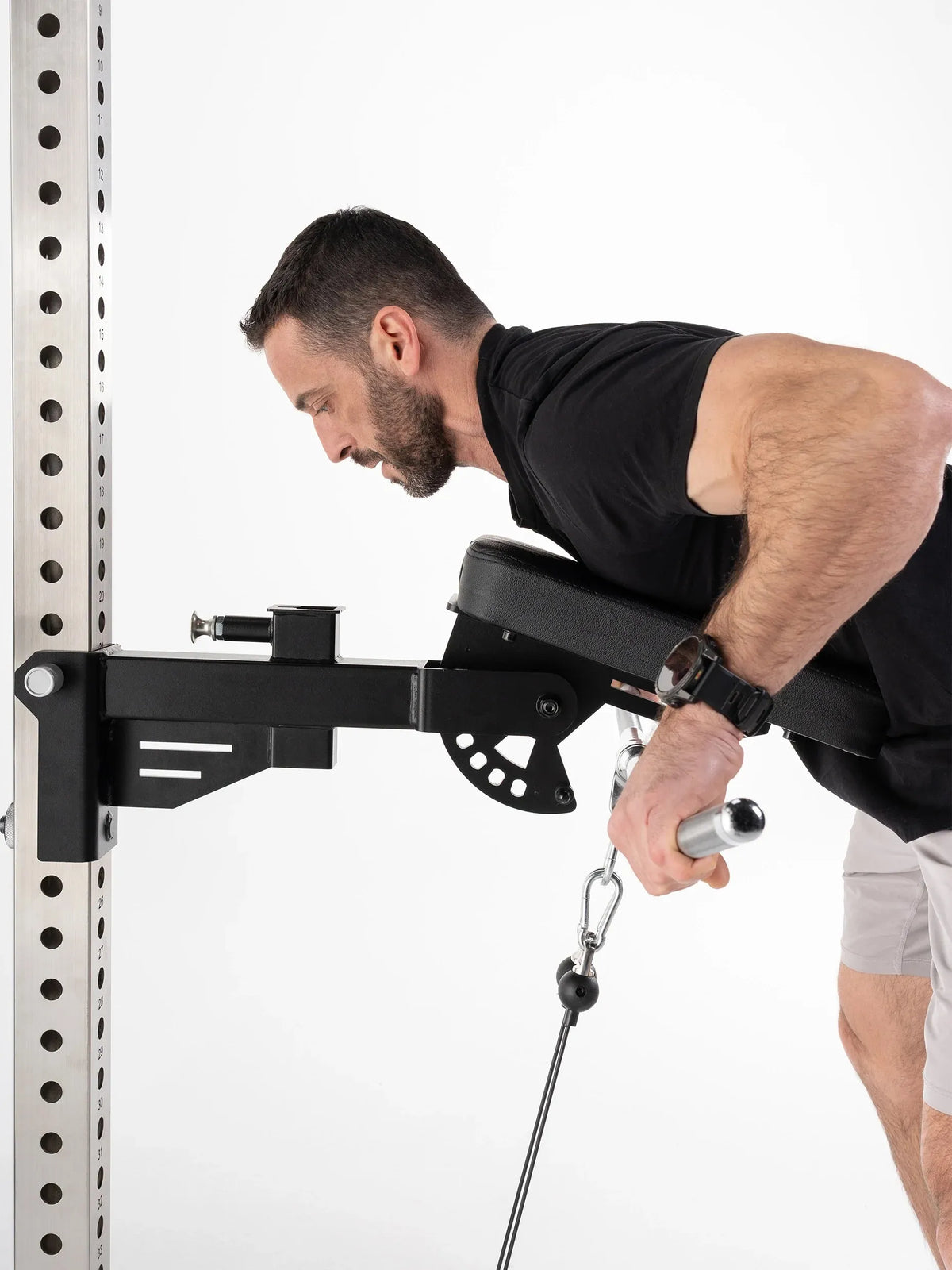 Stinger Functional Cable Tower - single-arm rowing with padded bench and sturdy frame