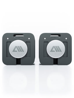 QUAD - two adjustable dumbbells, gray base, silver plates, central logo
