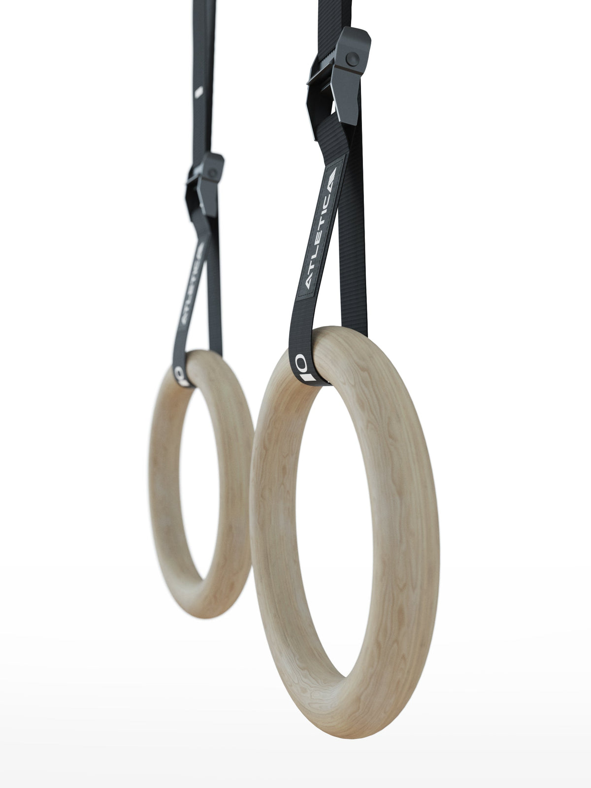 Wooden Gymnastic Rings - two wooden gymnastic rings on black nylon straps