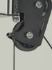 Man doing cable exercises on the Atletica Harrier functional trainer, with pulley and handle details