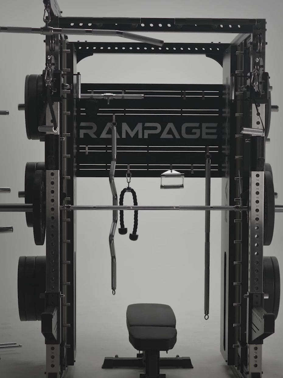Man doing cable rows, pull-ups and loading plates on the Atletica Rampage all-in-one trainer