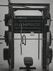 Man doing cable rows, pull-ups and loading plates on the Atletica Rampage all-in-one trainer