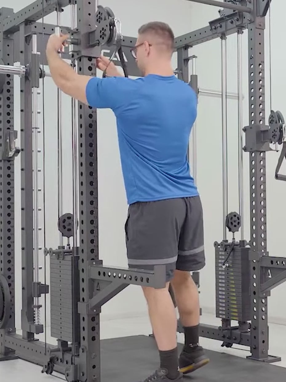 Video: man using the high cable pulley of the Atletica R8 Bradley Combat Long power rack