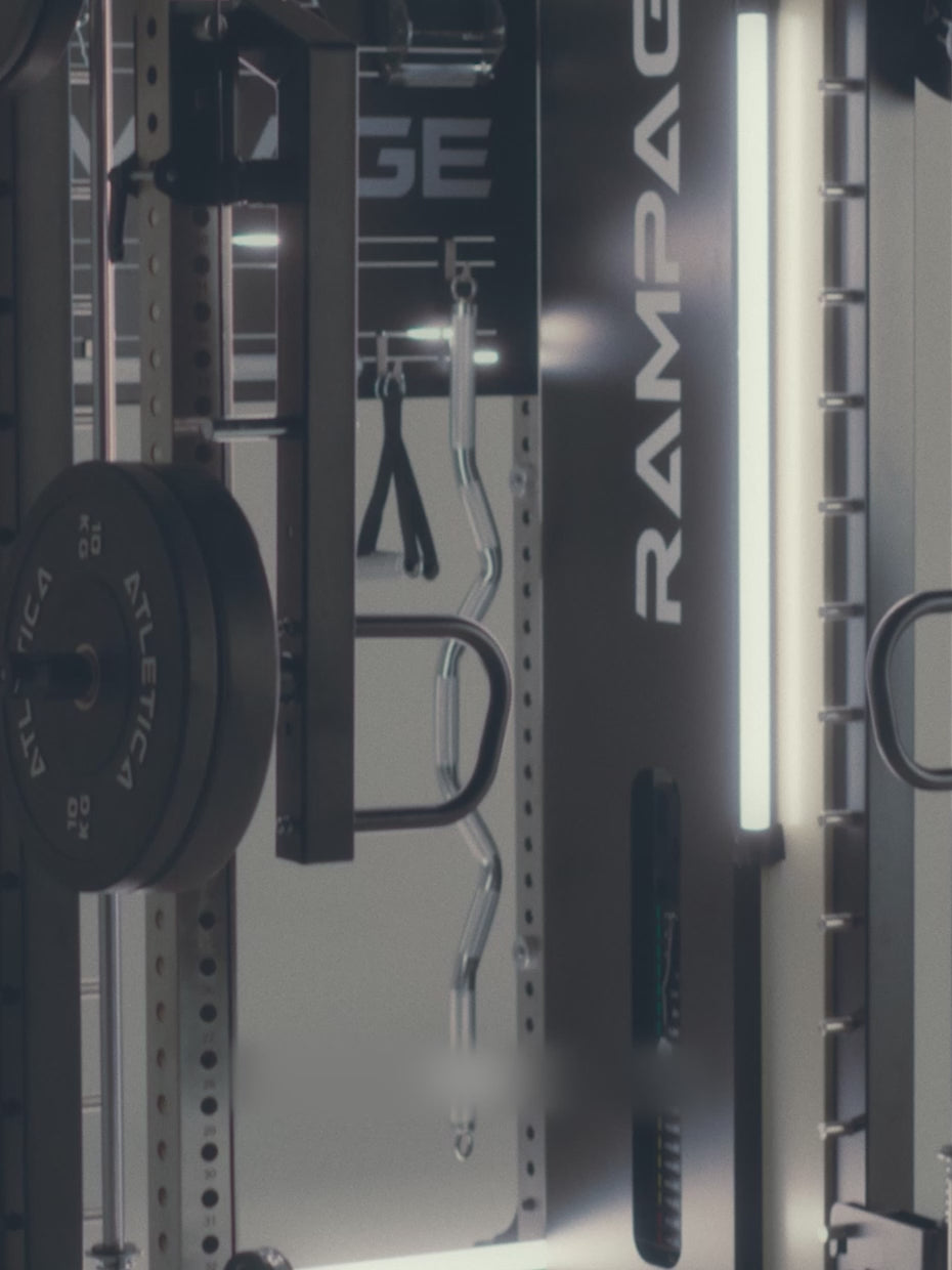 Man doing overhead presses on the Atletica Rampage all-in-one trainer, detail of the frame