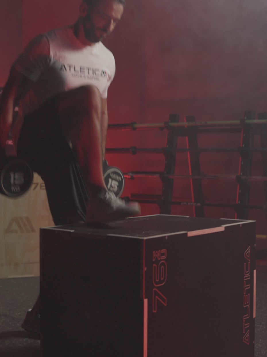 Video: man training on the Atletica anti-slip plyobox in a gym with red light