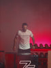 Video: man with the Atletica Plyobox SoftStep jump box in a gym with red lighting